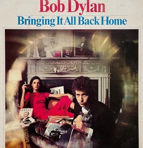 Album cover of Bob Dylan's Bringing It All Back Home featuring Dylan and a woman in a living room setting.