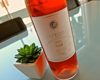 Lodi Rosé wine bottle from the Lodi Winegrape Commission, showcasing a 2014 vintage with a pink hue.