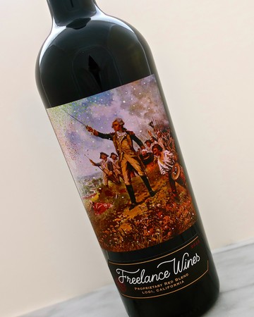 Wine bottle featuring a colorful, artistic label with a historical scene and vintage car, promoting Lodi wines.