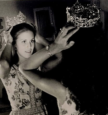 Young woman receiving a crown at a celebration, representing Lodi Winegrape Commission events.