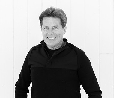 Smiling man in black sweater standing against a white background, representing Lodi Winegrape Commission.