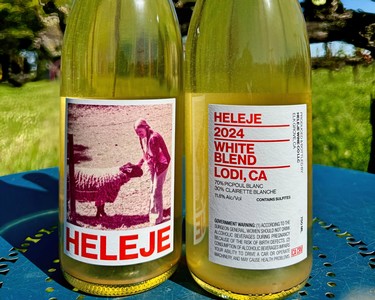 Close-up of Heleje 2024 White Blend wine bottle with label details in Lodi, California.