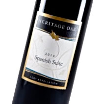 Close-up of a 2014 Spanish Suite wine bottle from Lodi Winegrape Commission, showcasing premium wine quality and heritage.