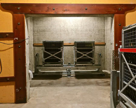 Wine cellar with fermentation tanks and storage racks at Lodi Winegrape Commission.
