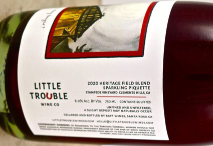 Lodi Winegrape Commission Heritage Field Blend wine bottle label with vineyard image and details.