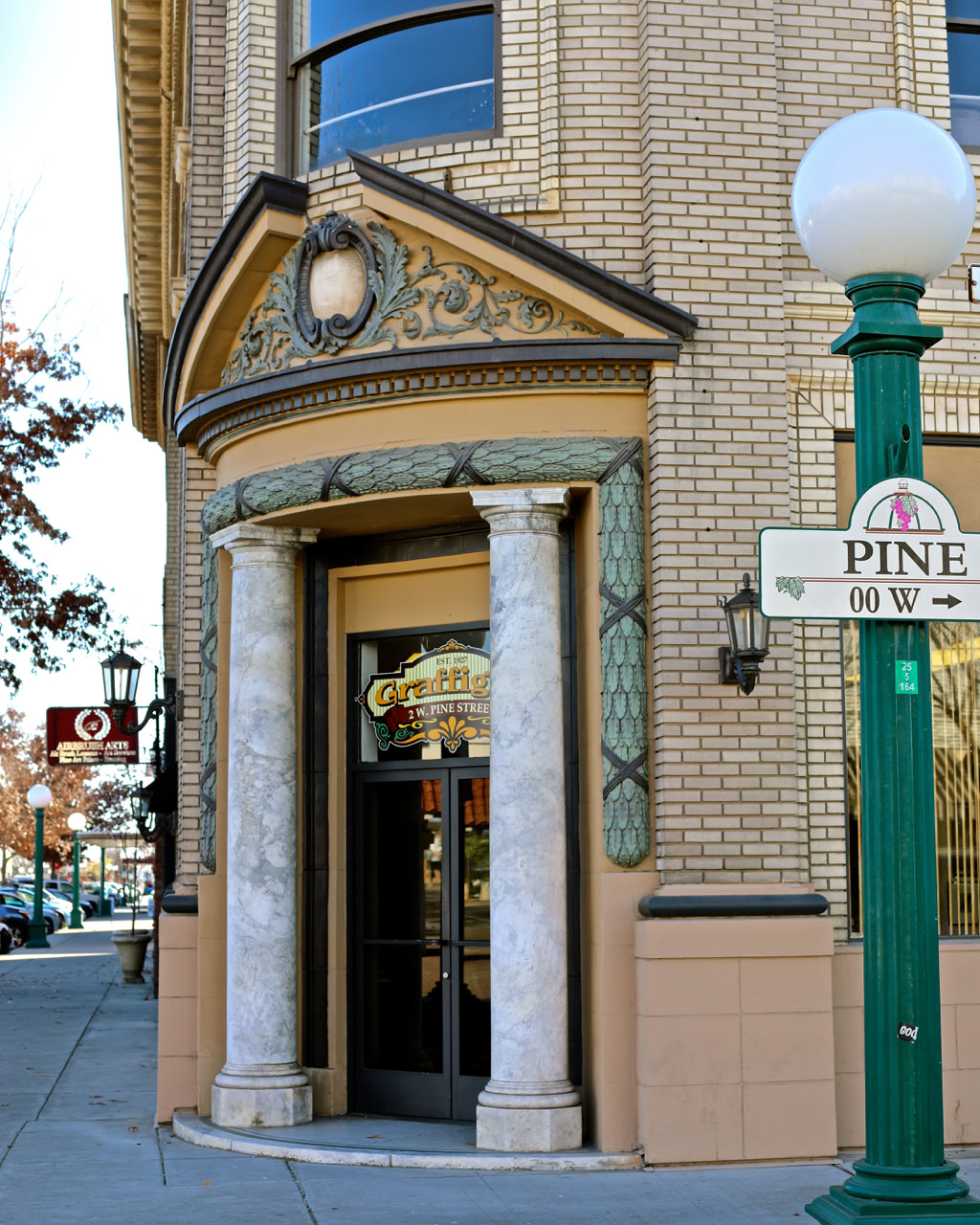 Historic building with ornate architectural details and a decorative entrance in Lodi, California.