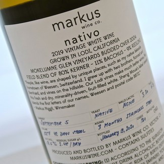 Close-up of a white wine label from Lodi, California, showcasing the vintage, vineyard, and production details.