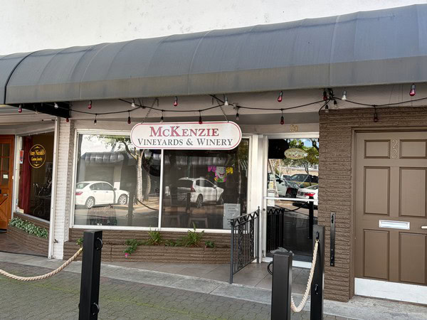 Exterior view of McKenzie Vineyards & Winery in Lodi, California, showcasing the storefront and entrance.