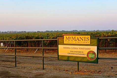 Sierra Loma Vineyard sign at McManis Family Vineyards in Lodi, California, showcasing sustainable winegrowing practices.