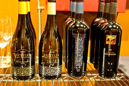 Selection of wine bottles from Lodi Winegrape Commission showcasing local wines and labels.