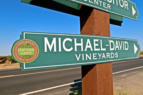 Sign for Michael-David Vineyards, a certified green winery in Lodi, California, known for sustainable winegrowing practices.