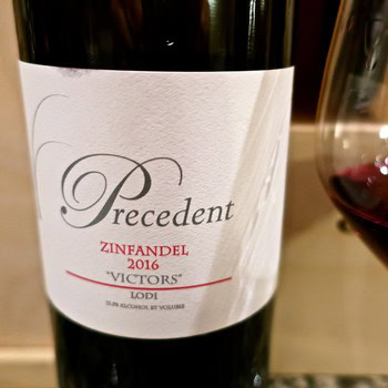Close-up of Precedent Zinfandel 2016 wine bottle label from Lodi Winegrape Commission.