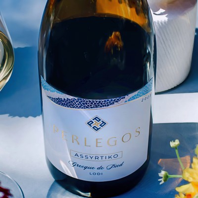 Lodi Assyrtiko wine bottle from the Lodi Winegrape Commission, showcasing Greek grape variety in California.