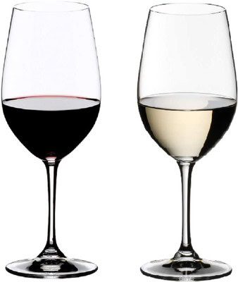 Two wine glasses, one with red wine and one with white wine, on a clear background.