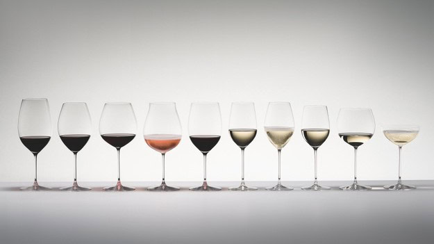 A lineup of nine wine glasses with different types of wine from Lodi Winegrape Commission.
