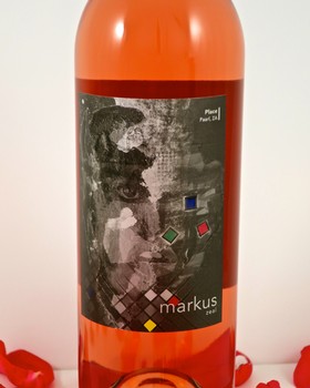 Close-up of a wine bottle with abstract label design from Lodi Winegrape Commission.