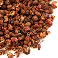 Close-up of dried grape clusters used in Lodi wine production, showcasing rich colors and textures.
