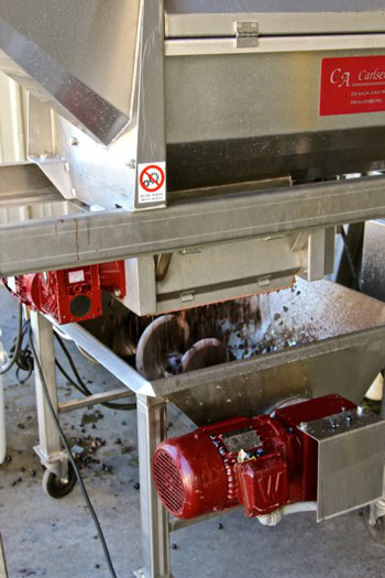 Lodi Winegrape Commission equipment used for grape processing and crushing in a winery.