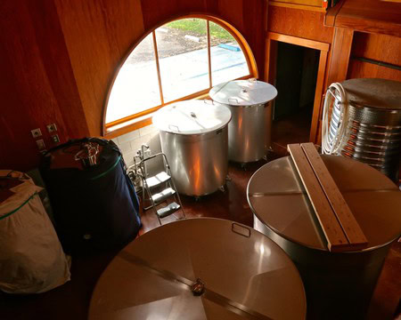 Winery fermentation tanks and equipment at Lodi Winegrape Commission in California.