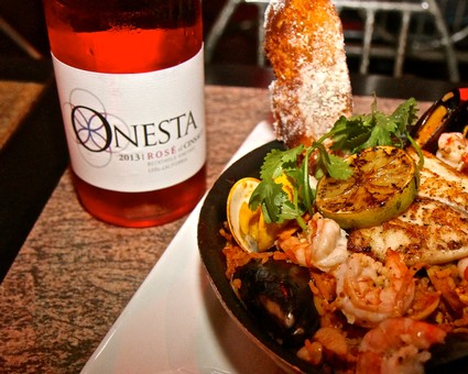 Seafood dish with wine and bread at Lodi Winegrape Commission event.