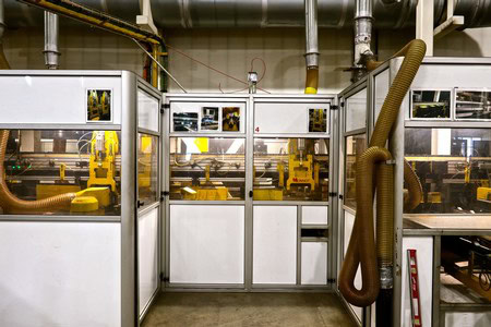 Industrial winery equipment at Lodi Winegrape Commission facility for wine production and processing.