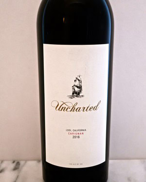 Bottle of Uncharted 2016 wine from Lodi, California with minimalist label design.