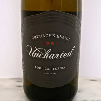 Bottle of Grenache Blanc 2016 from Lodi, California, with Uncharted label for wine marketing.