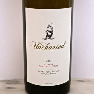 2017 Uncharted Picpoul wine bottle from Terra Alta Vineyard, Lodi, California, with a ship illustration on the label.