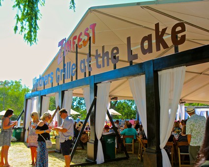 Lodi Winegrape Commission booth at the Lake, showcasing local wines and grape varieties.