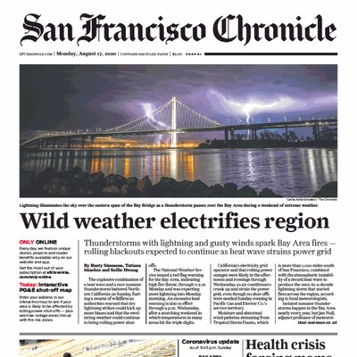 Lightning illuminates the sky over the Bay Bridge in San Francisco during a thunderstorm.