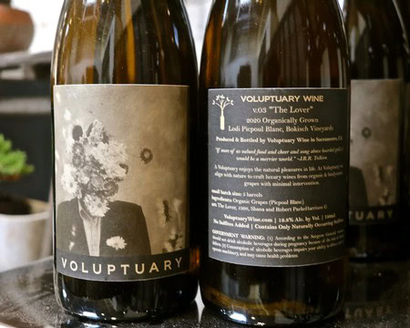 Close-up of Voluptuary wine bottle label from Lodi Winegrape Commission, organic and handcrafted wine from California.