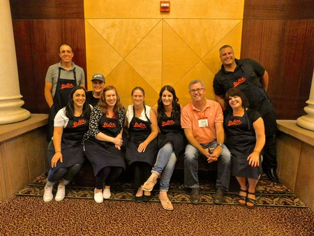 Group photo of Lodi Winegrape Commission team members at an event.