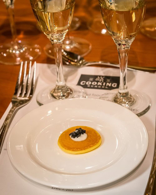 Wine glasses and a plated appetizer at a Lodi Winegrape Commission event.