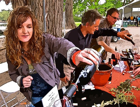 People enjoying wine tasting at Lodi Winegrape Commission event outdoors with trees in background.