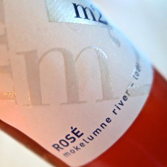 Close-up of a Rosé wine bottle label from Lodi Winegrape Commission, showing the name and origin details.